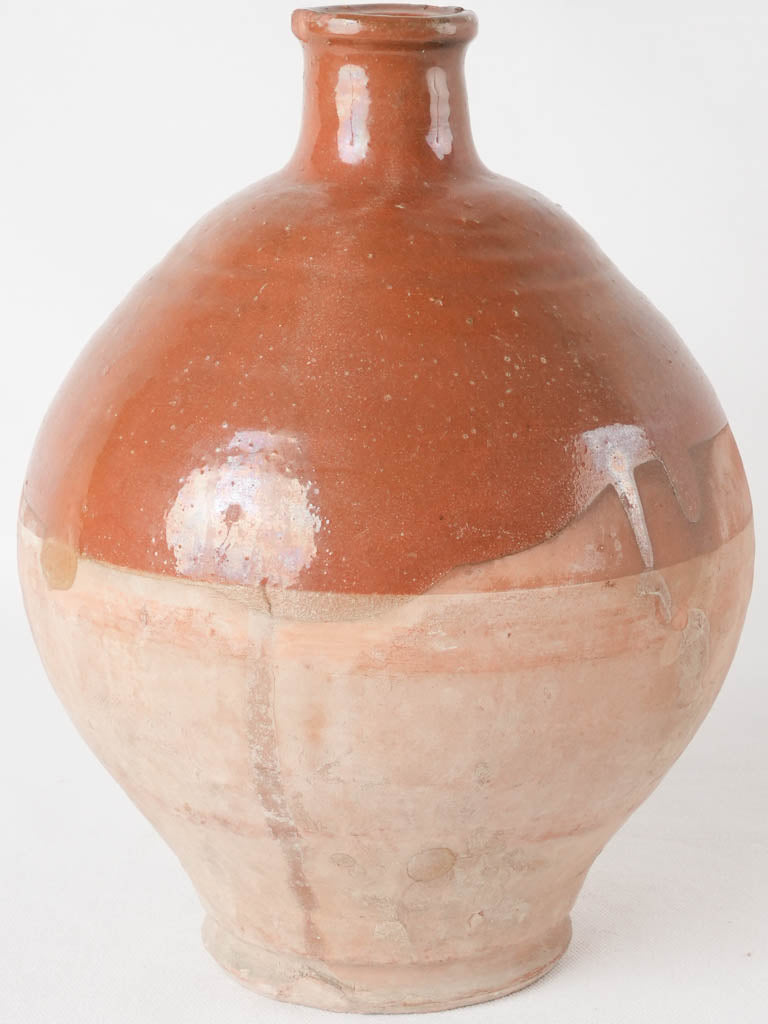 Antique terracotta olive oil bottle