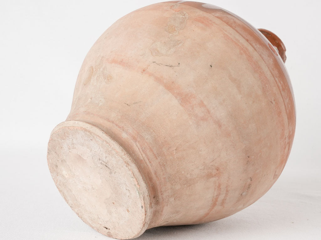 Provenance-rich terracotta oil bottle