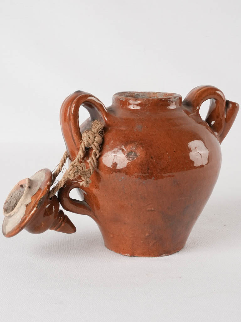 Retro style earthen pitcher with lid