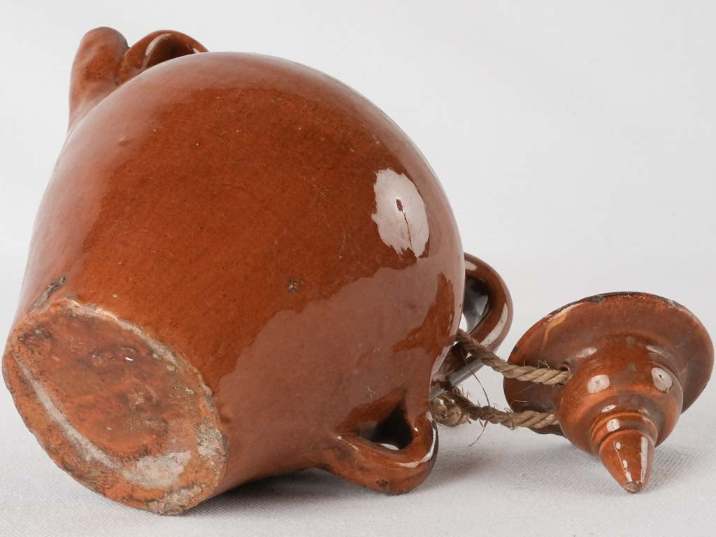 Time-worn provincial brown stoneware pitcher