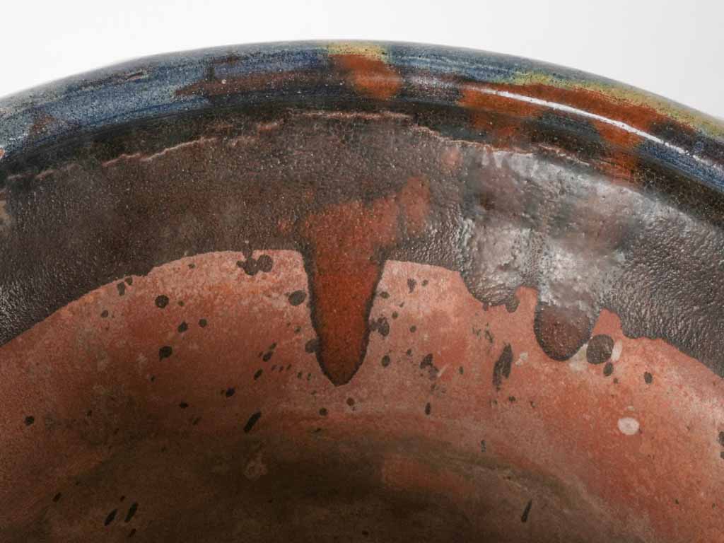 Artisanal yellow-detailed terracotta pot