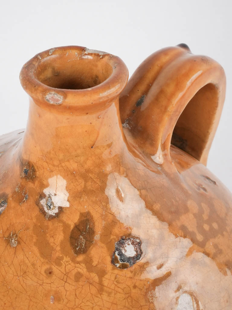 Time-worn French ocher vessel