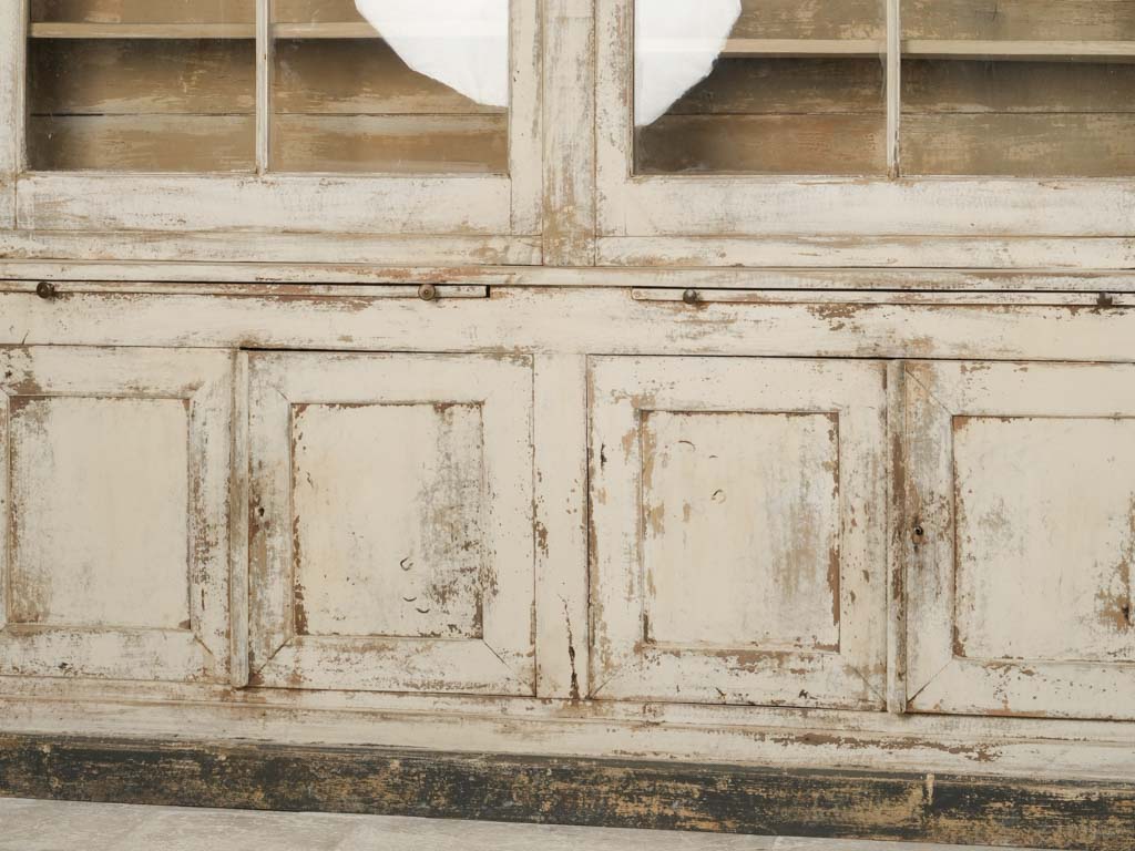 Rustic, 19th-century French glass-door bookcase