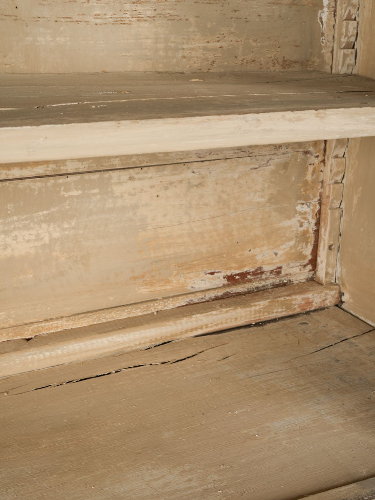 Classic, distressed French glass-door bookcase