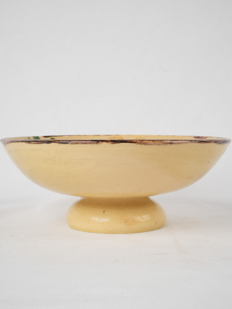 Vintage yellow-glazed ceramic footed dish