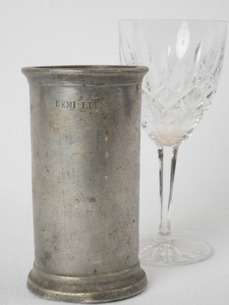 Historical rustic half-liter pewter measure