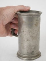 Charming historical measuring pewter piece