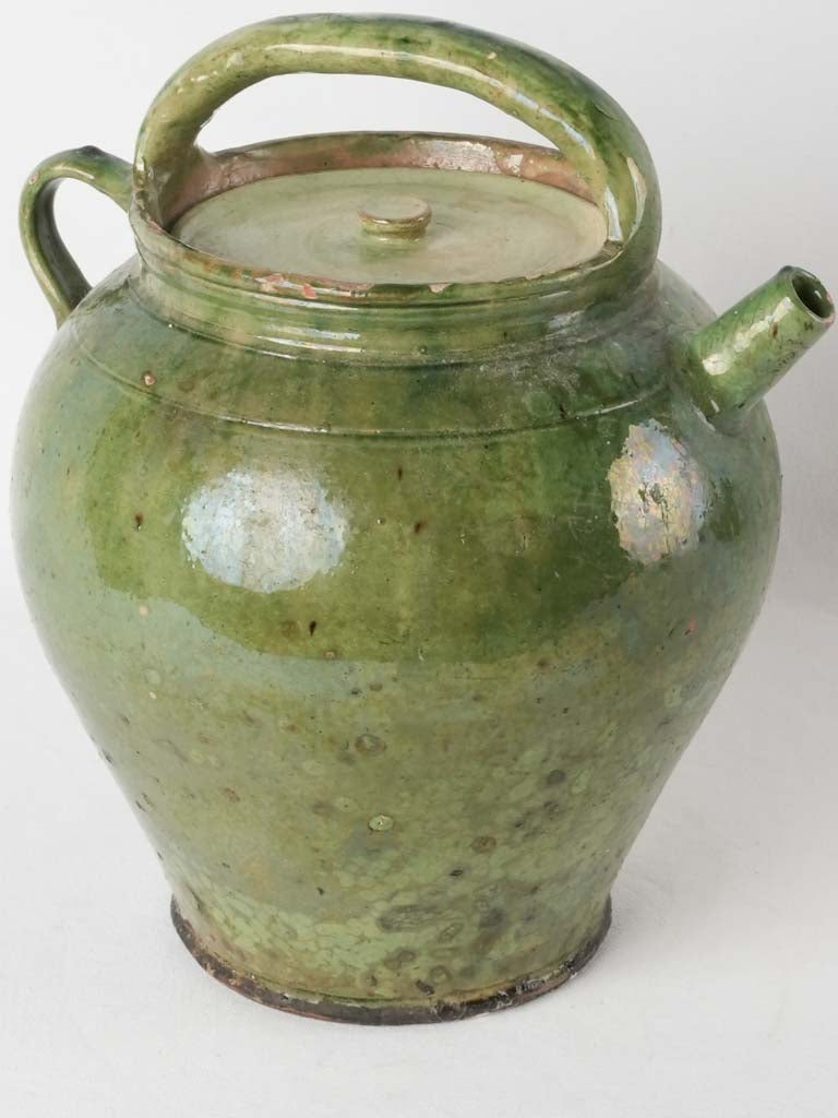 Ceremonial aged ceramic lidded jug