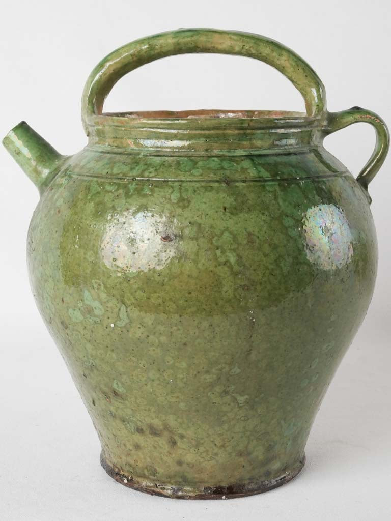 Traditional natural-toned pottery water pitcher