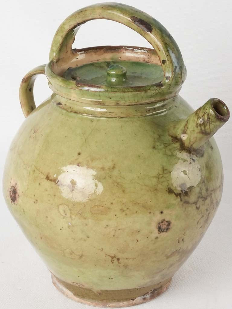 Historical green-glazed water pitcher