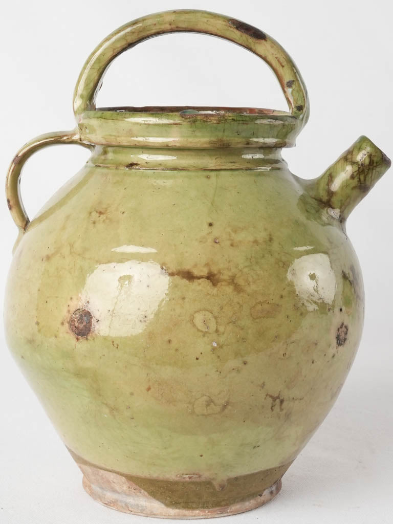 Early 20th-century ceramic pitcher, lid