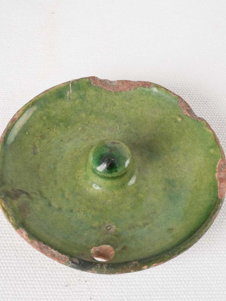 Authentically worn green glaze cruche