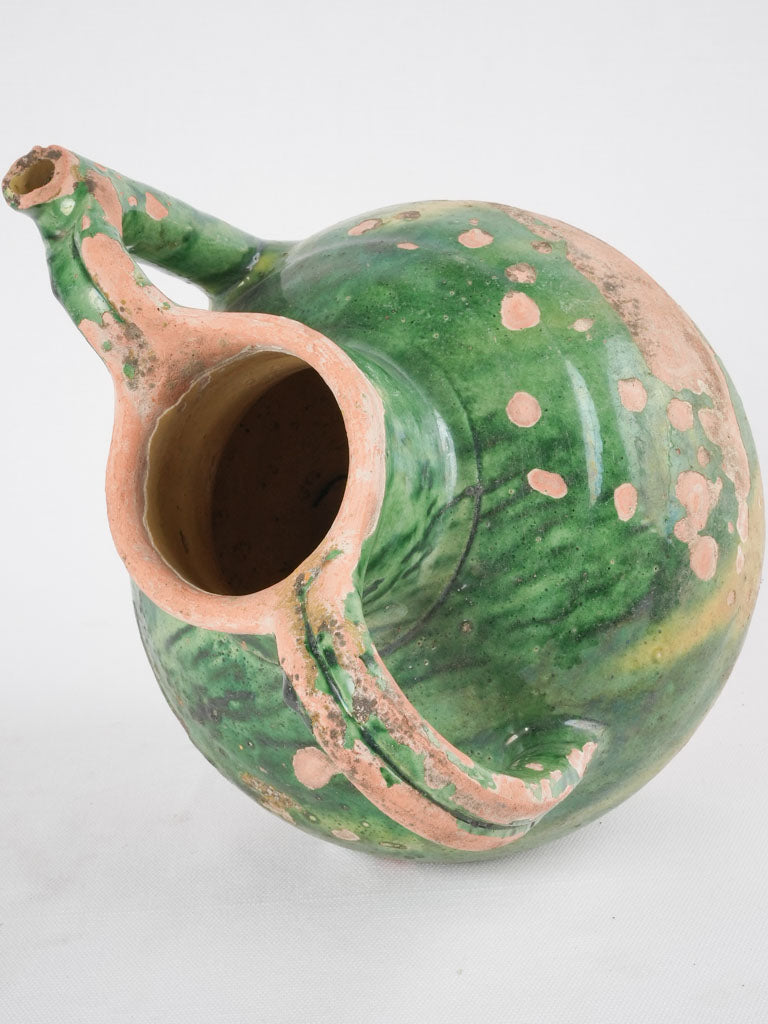 Wear-patinated antique French jug