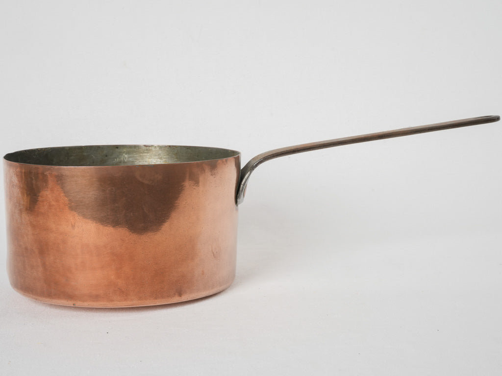 Rustic wrought-iron handled French copper saucepan