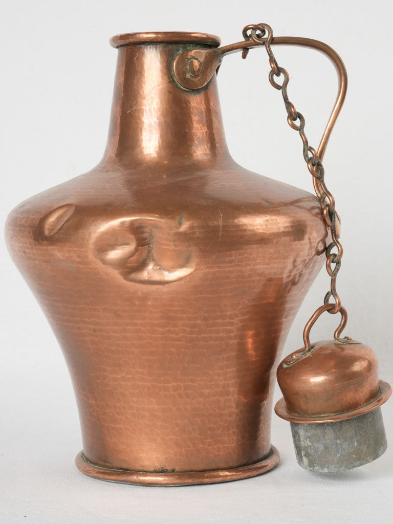 Textured antique copper amphora-shaped cauquemar