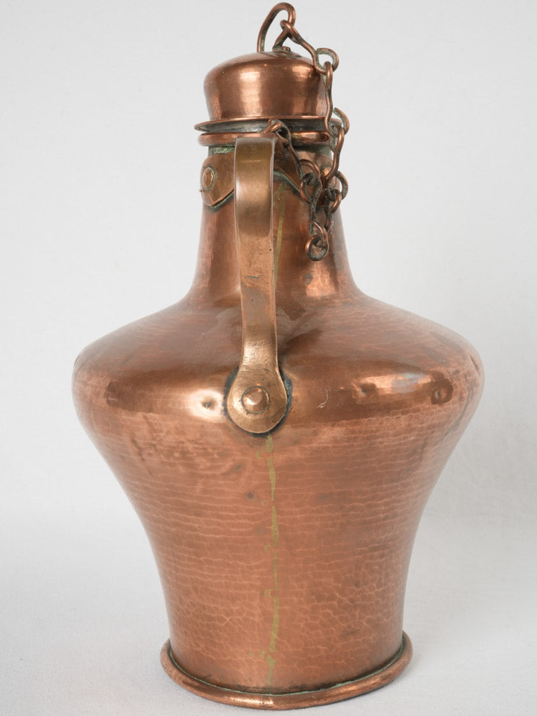 Aged amphora-style rustic copper kettle