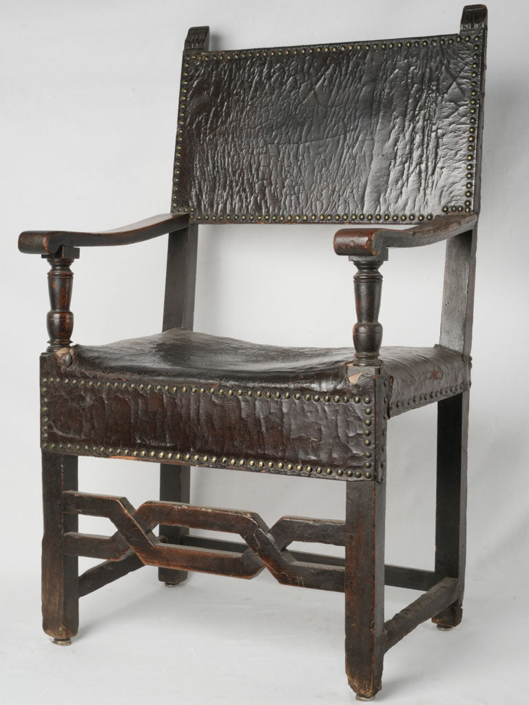 Aged, stately, Spanish walnut armchair