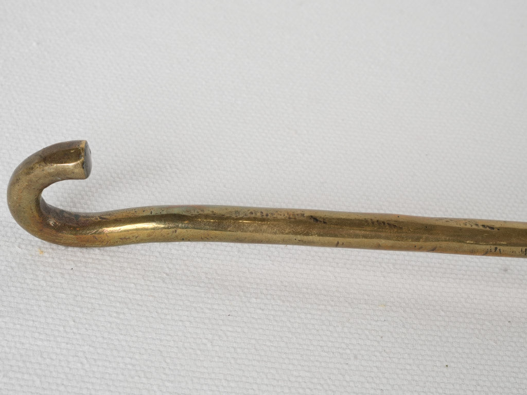 Longevity-focused brass cooking implement 