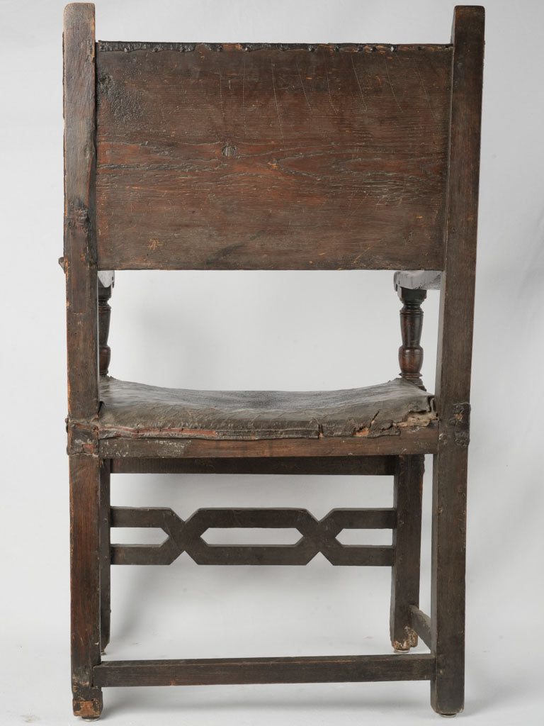 Aged, robust, Spanish armchair