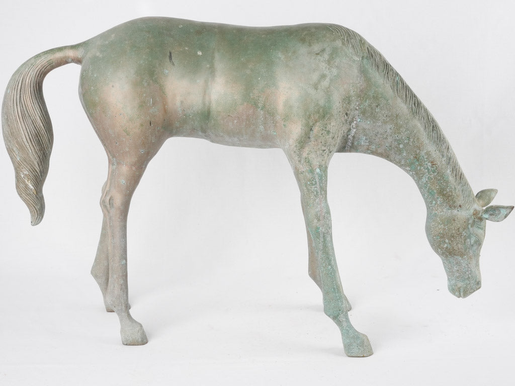 Time-worn grazing horse piece