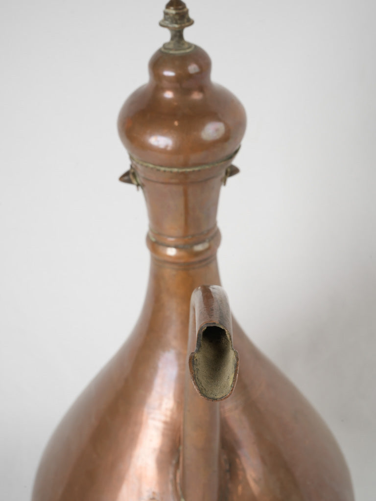 Traditional, practical, flared copper pourer