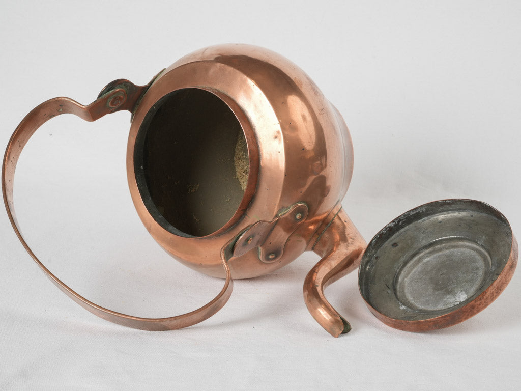 Brass knobbed antique copper kettle