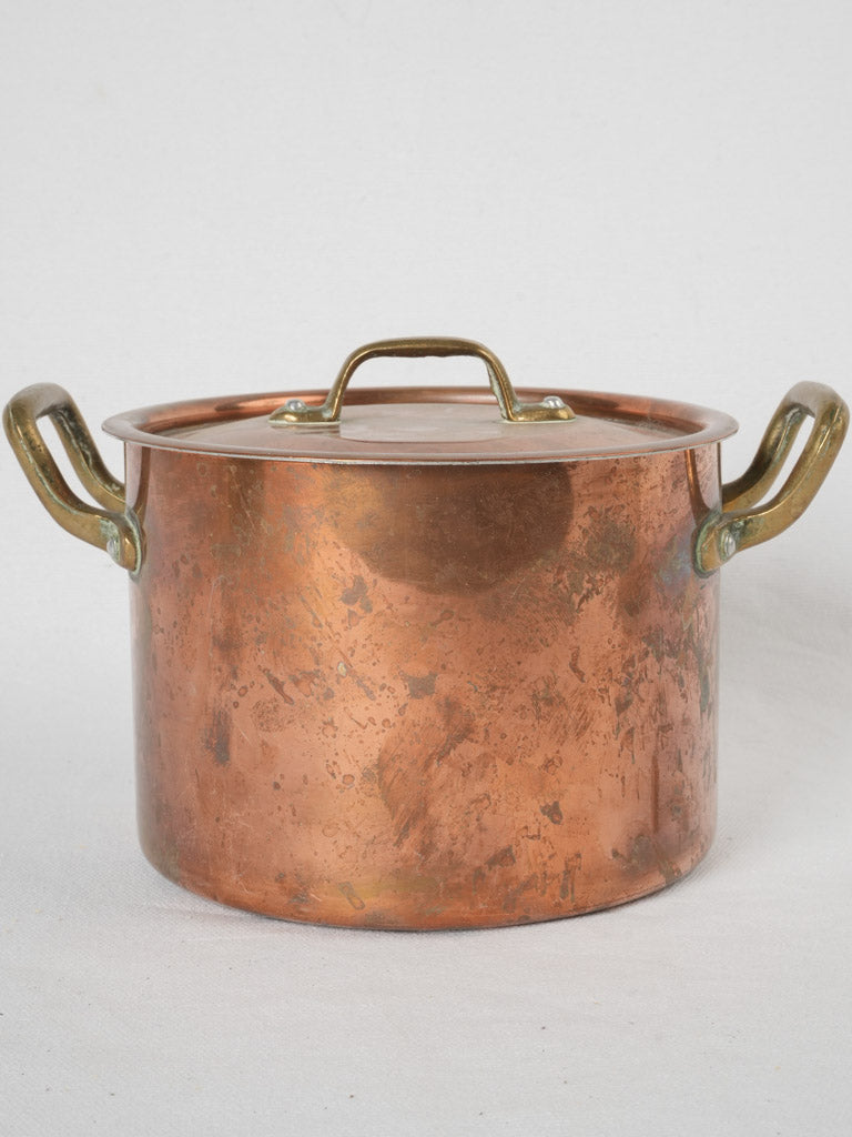 Antique brass-handled copper cooking pot