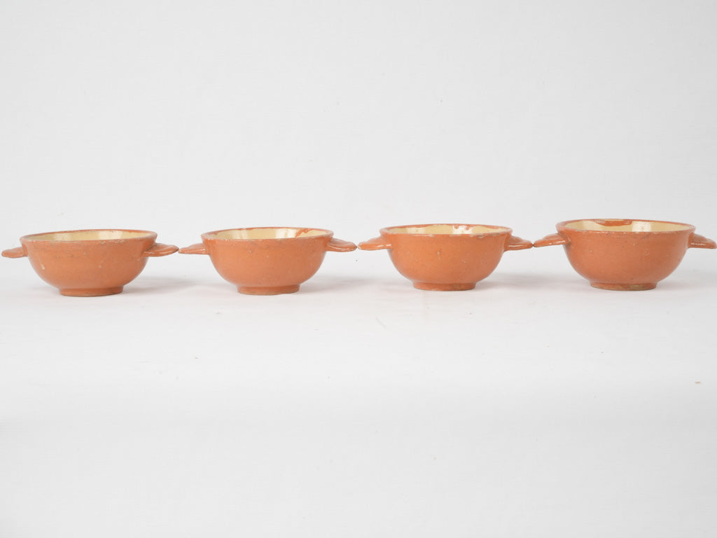 Classic ear-handled ocher serving bowls