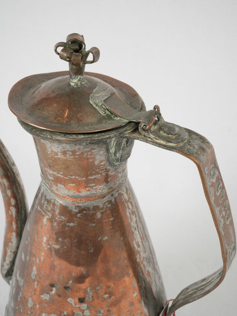 Rustic winemaker's jug with patina