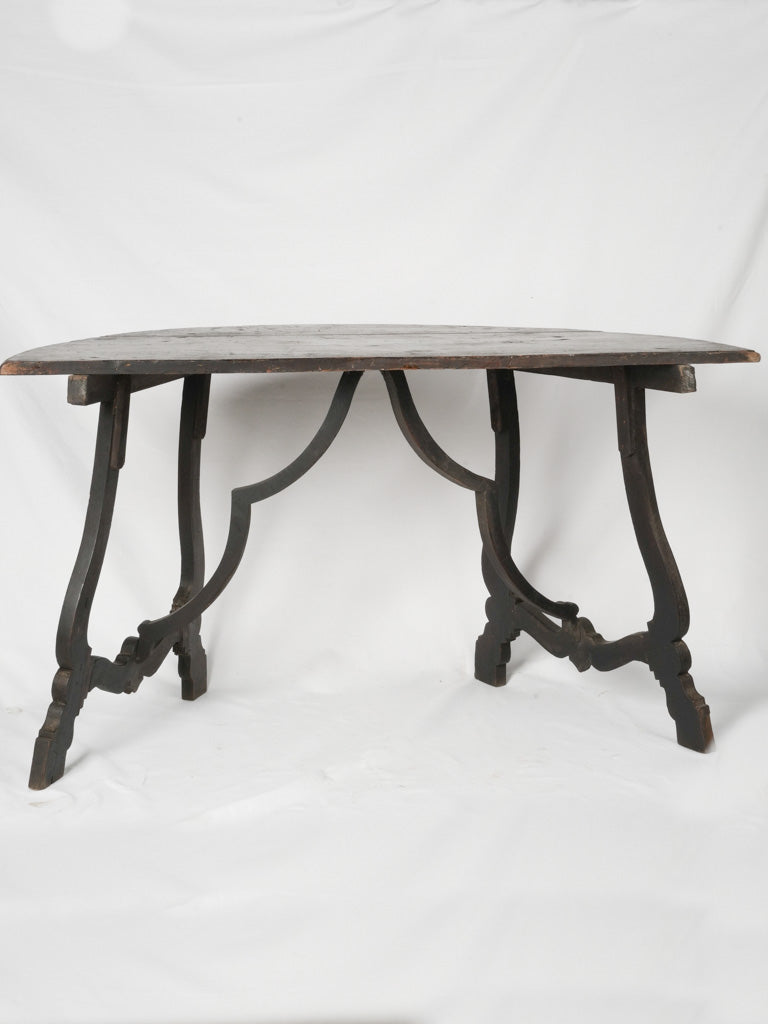 Versatile blackened walnut center table