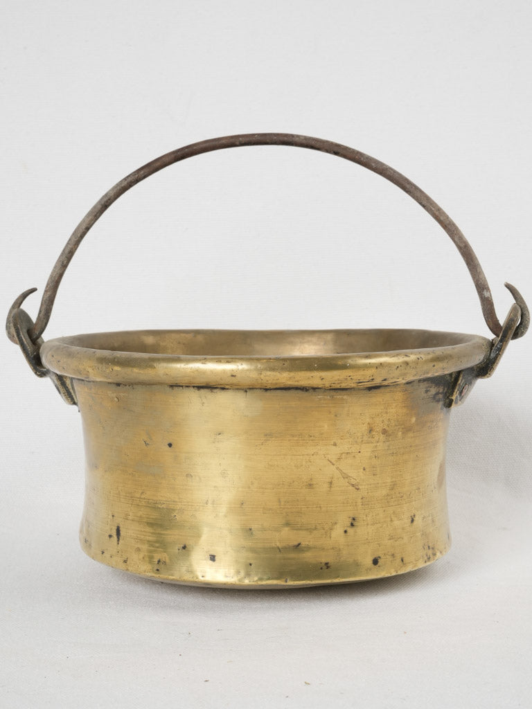 Rustic 19th-century metal cauldron