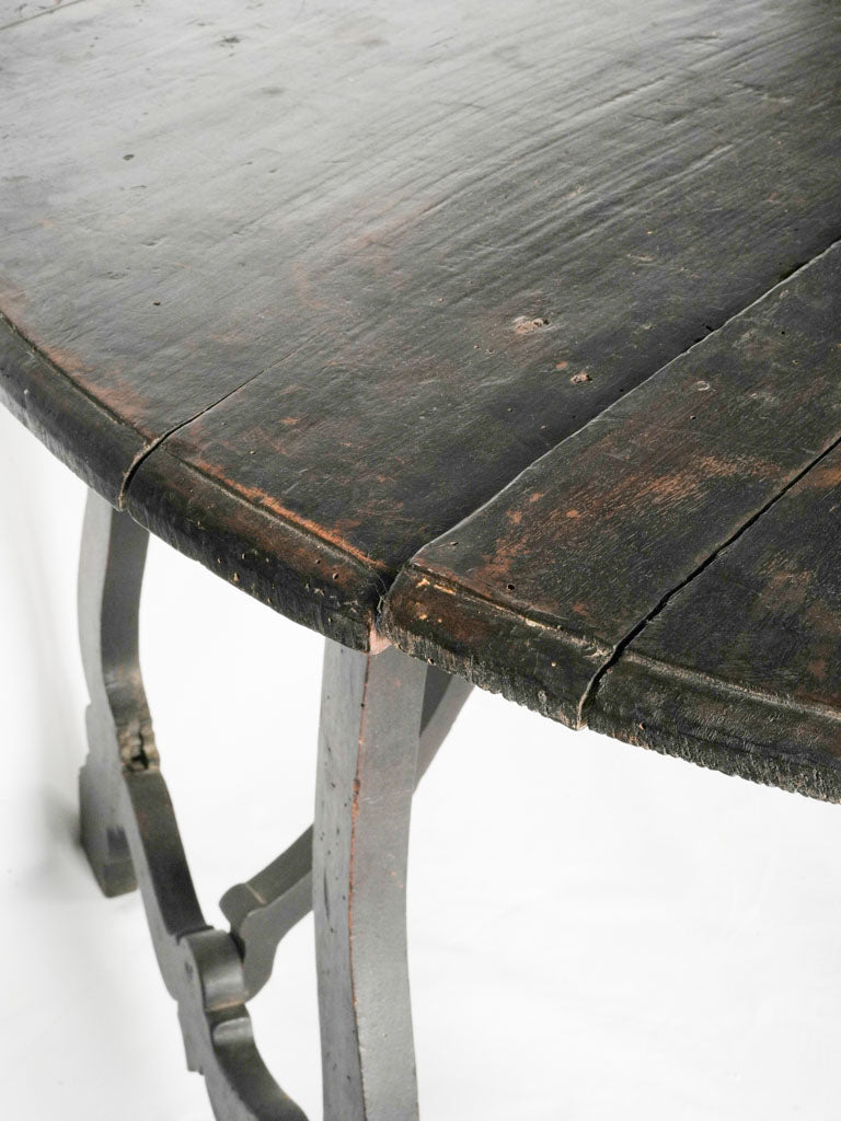 Formal blackened walnut console tables