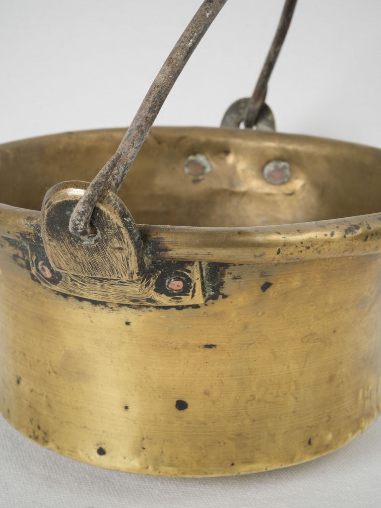 Time-worn French fireplace cauldron