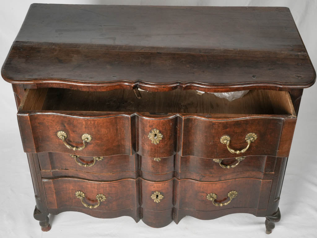 Elegant Regence Doe Feet Walnut Dresser