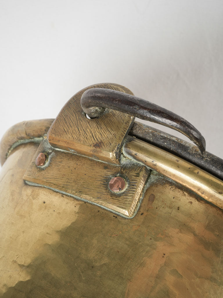 Historic brass cauldron for hearth cooking