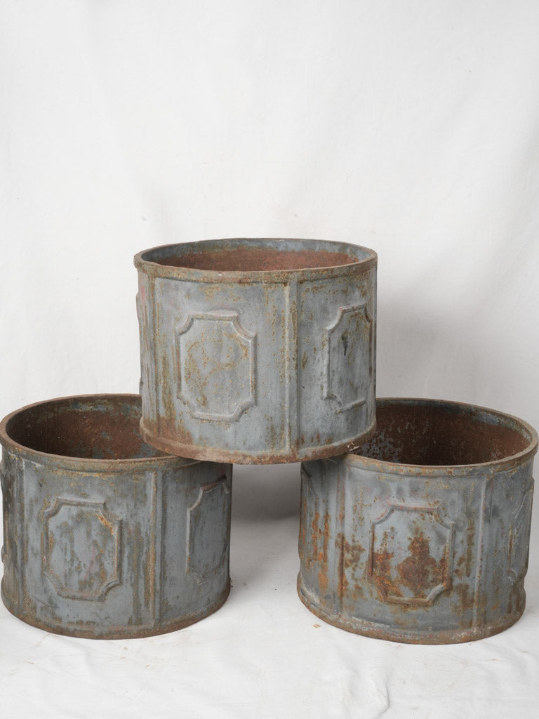 Rustic blue-gray cast iron planters