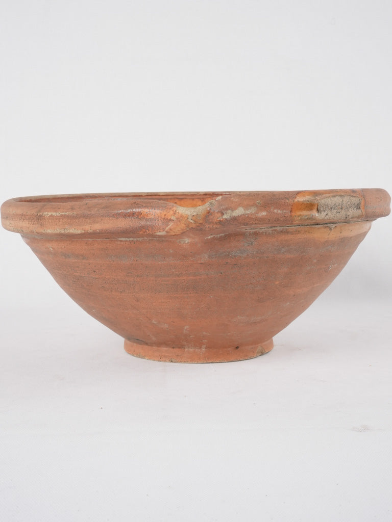 Rustic earthenware fruit bowl spout