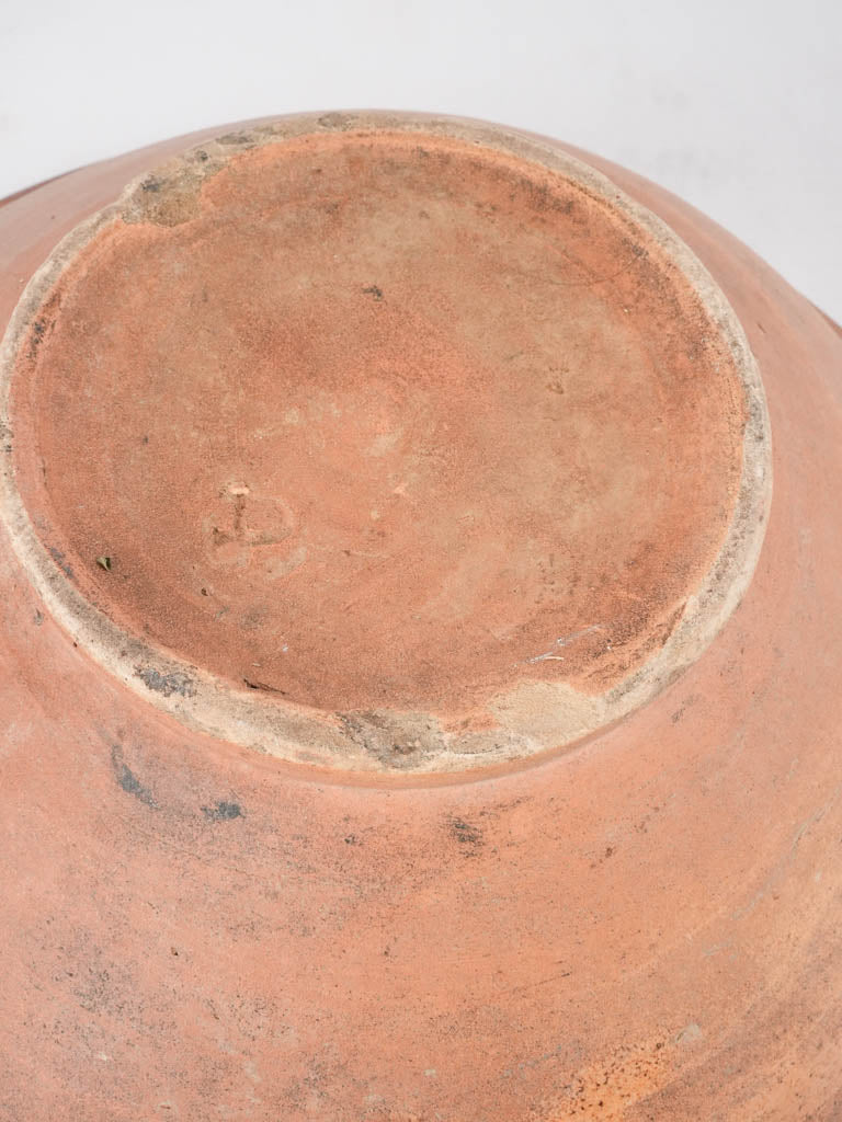 Old-world terracotta bowl with spout