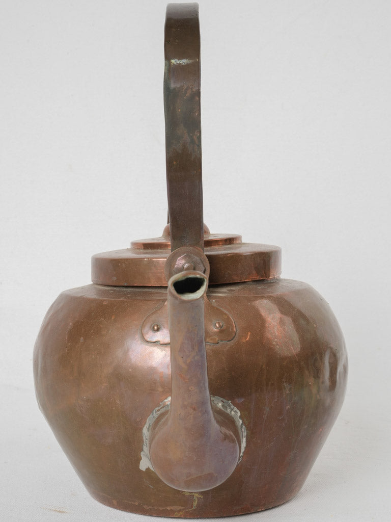 Aged French copper kettle with character