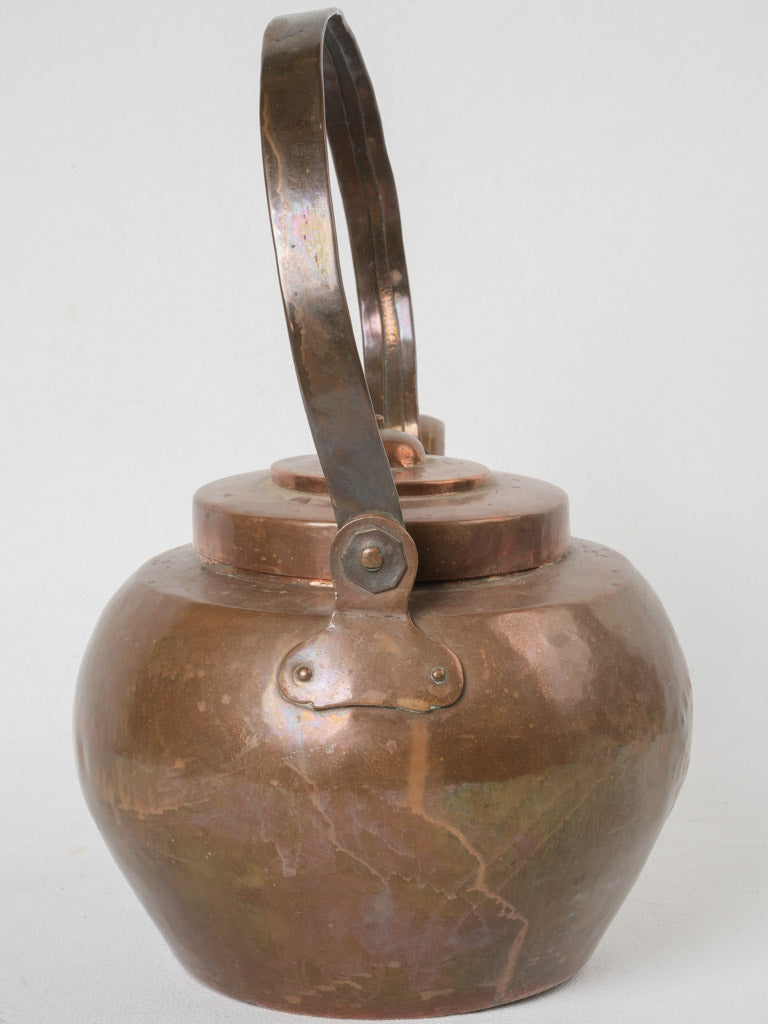 Elegant aged copper kettle collectible