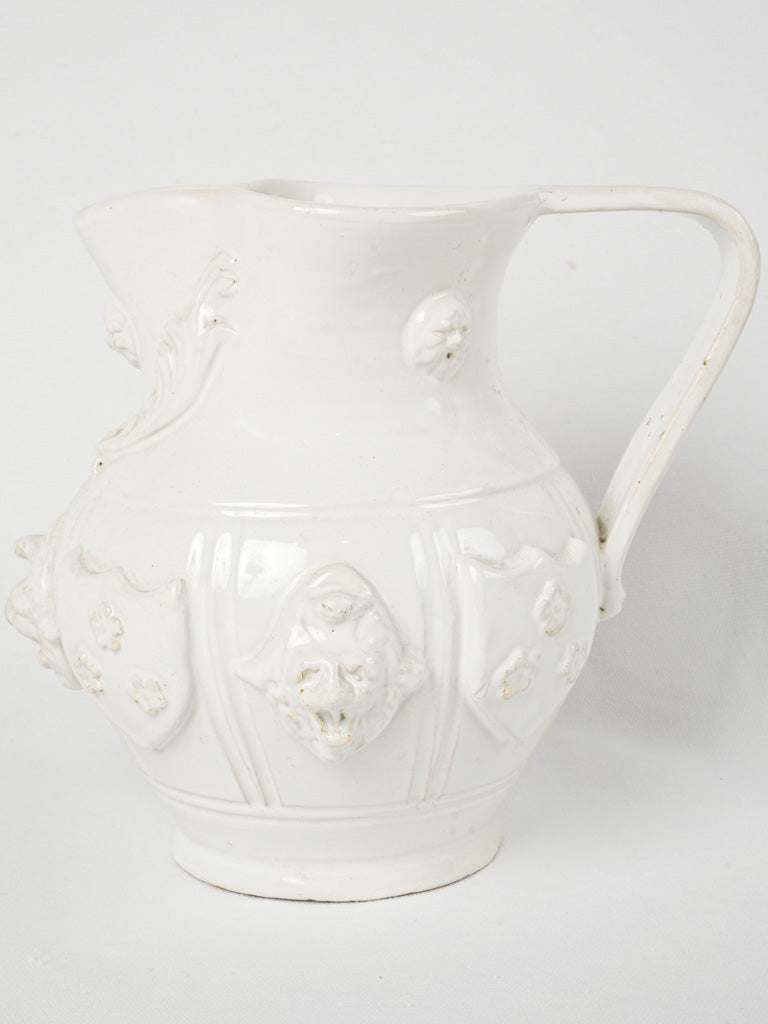 Ornate coat of arms pitcher