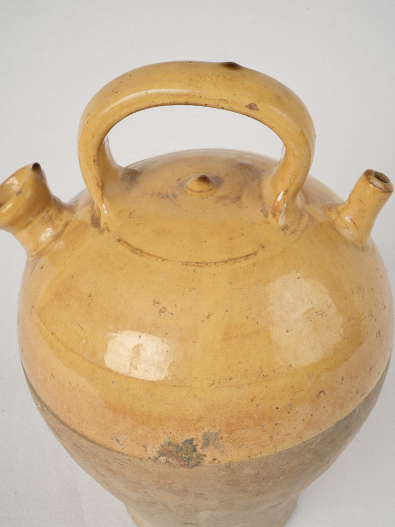 Worn Traditional Dual Spouted Pot