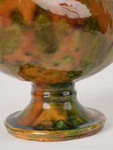 Ochre and green glazed antique pottery