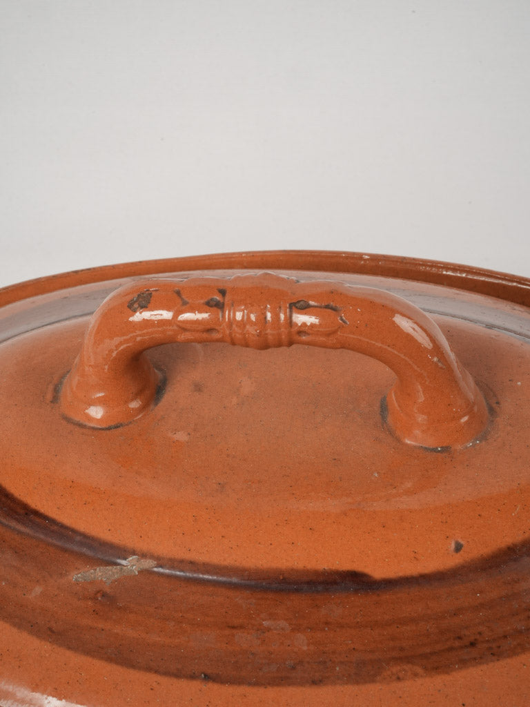 Warm-toned lidded French terracotta dish