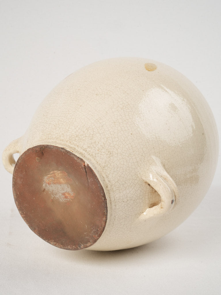 Traditional 19th-century white glazed oil jug