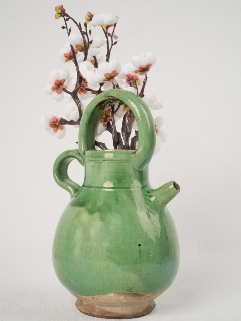 Charming rustic green terracotta pitcher