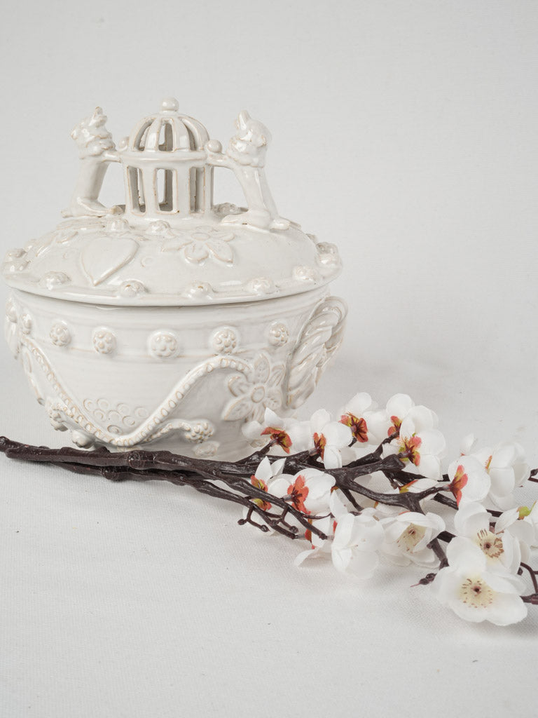 Ornate white glazed tureen