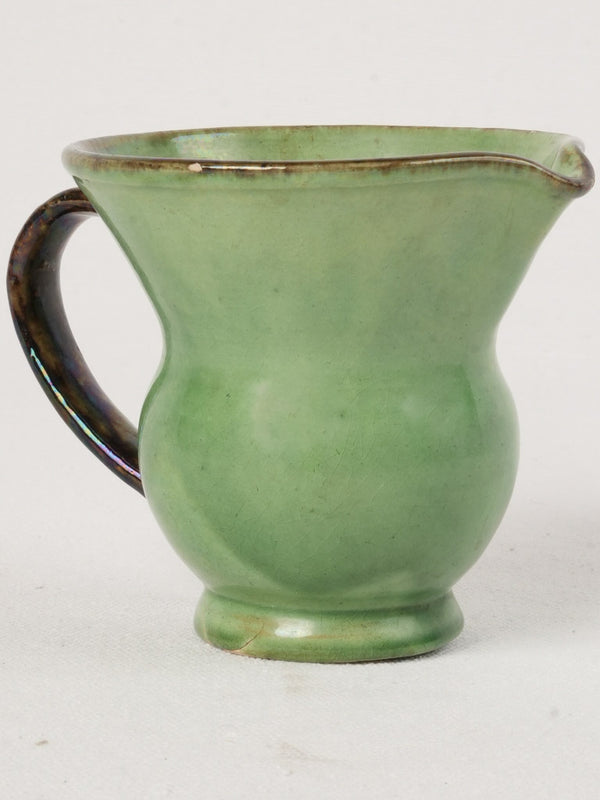 Antique green ceramic spittoon