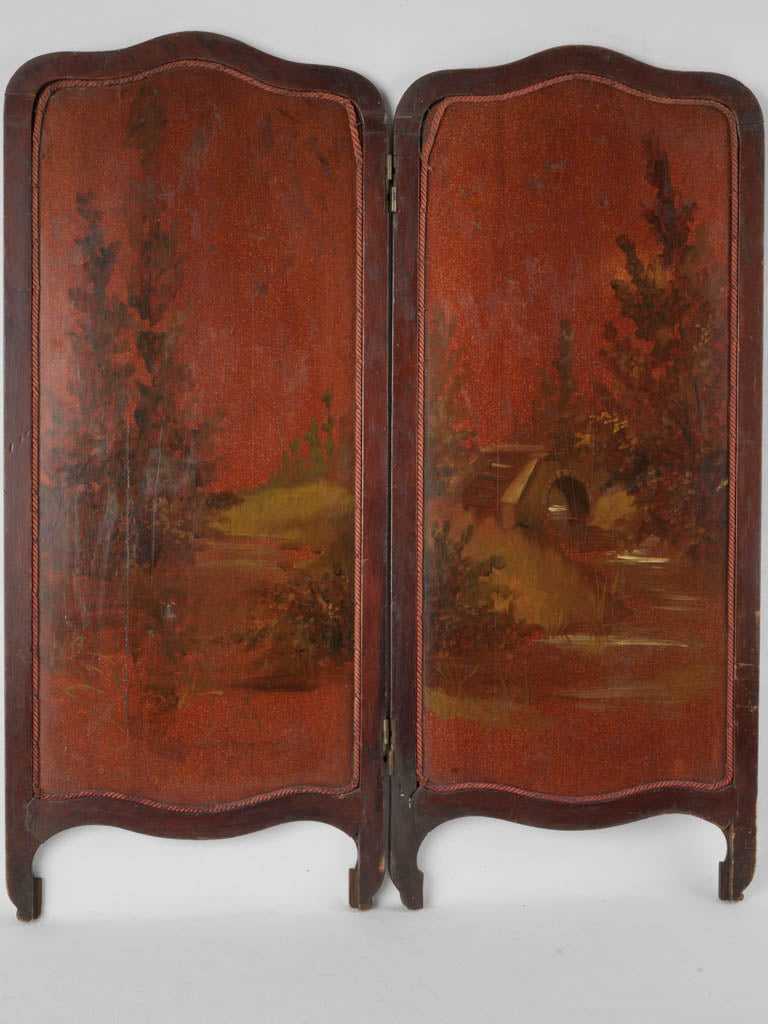 Dark, painted character divider