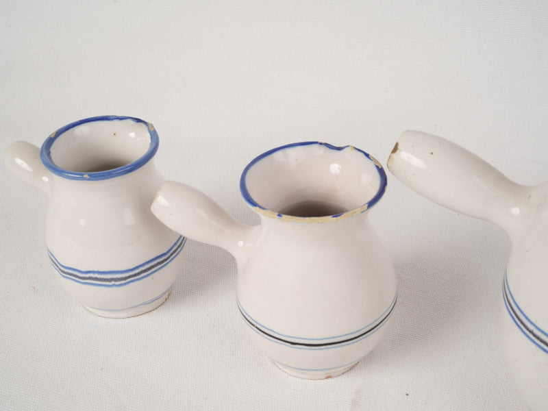 Graceful, vintage ceramic milk servers